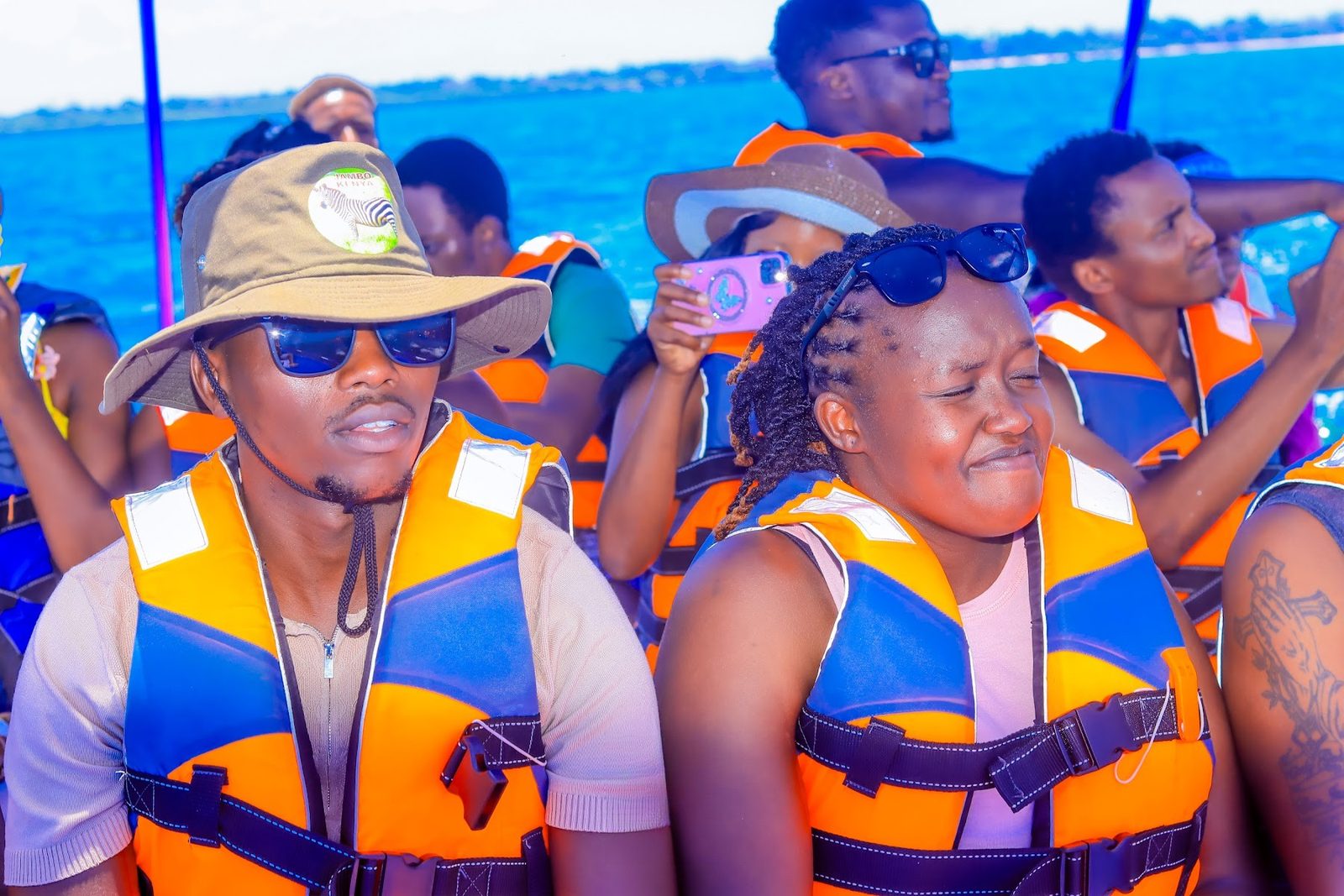 Guests in life jackets on the boat trip