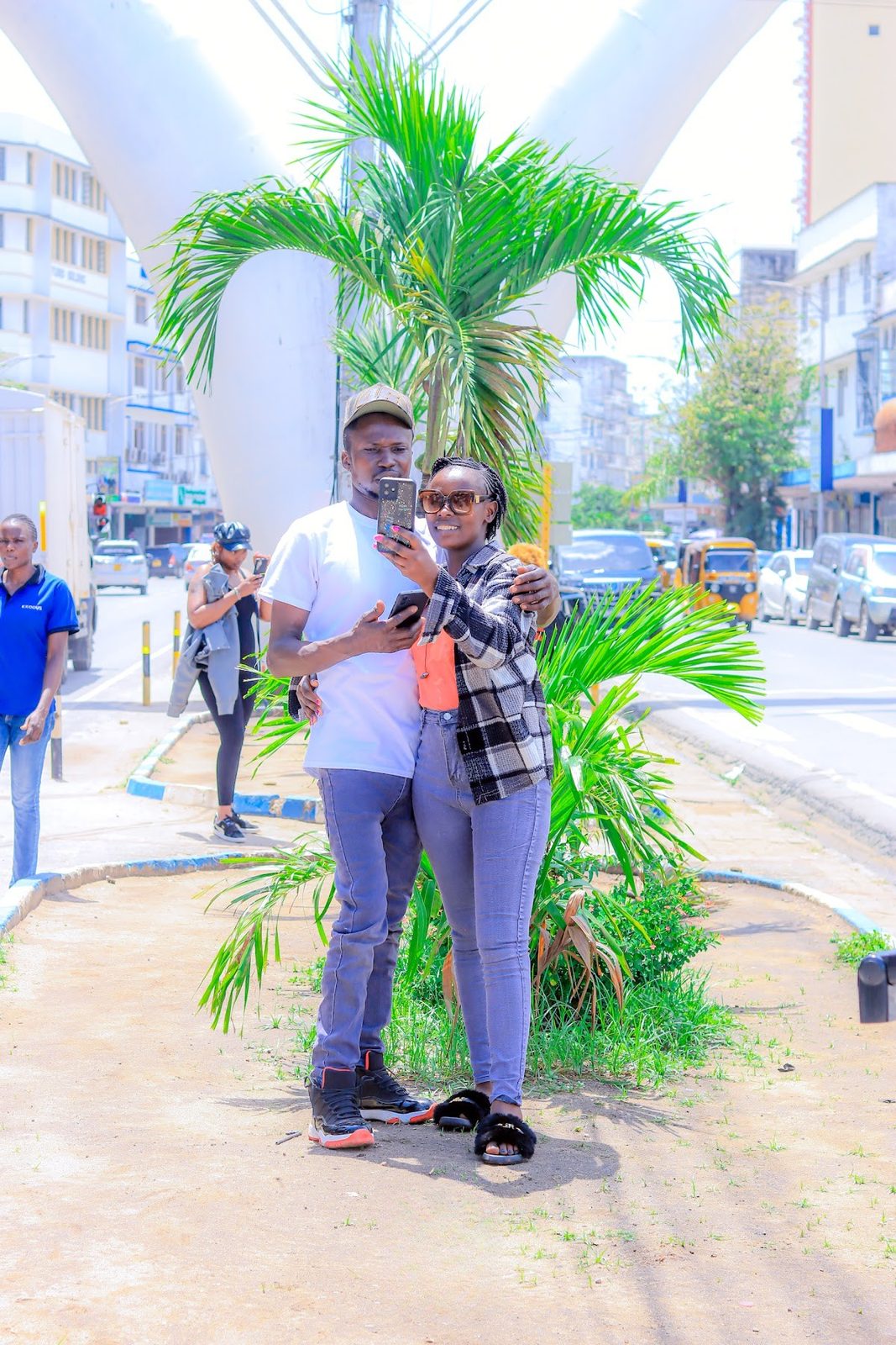 Guests taking photos on Moi Avenue