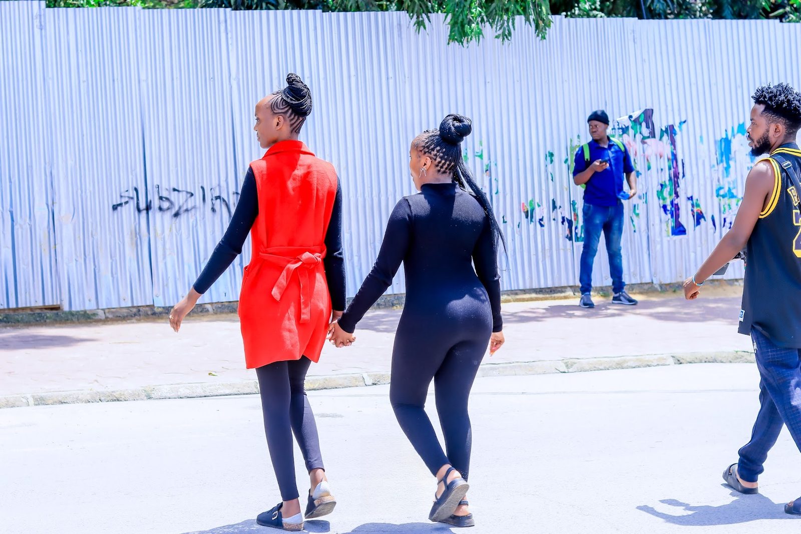 Guests strolling hand in hand through Mombasa town