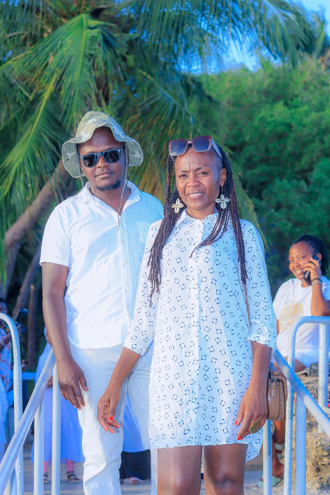 Couple in white hats on the cruise