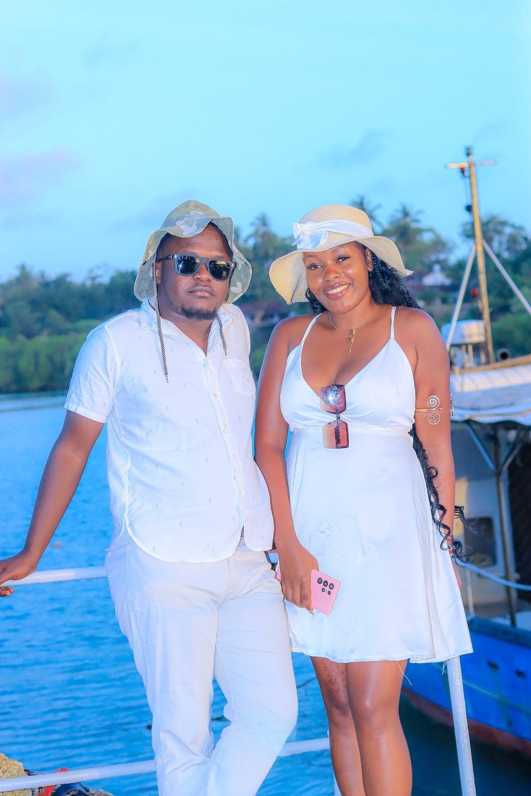 Couple in white on the sunset cruise