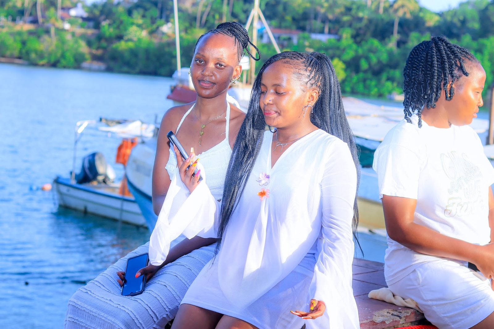 Friends in white aboard the creek cruise