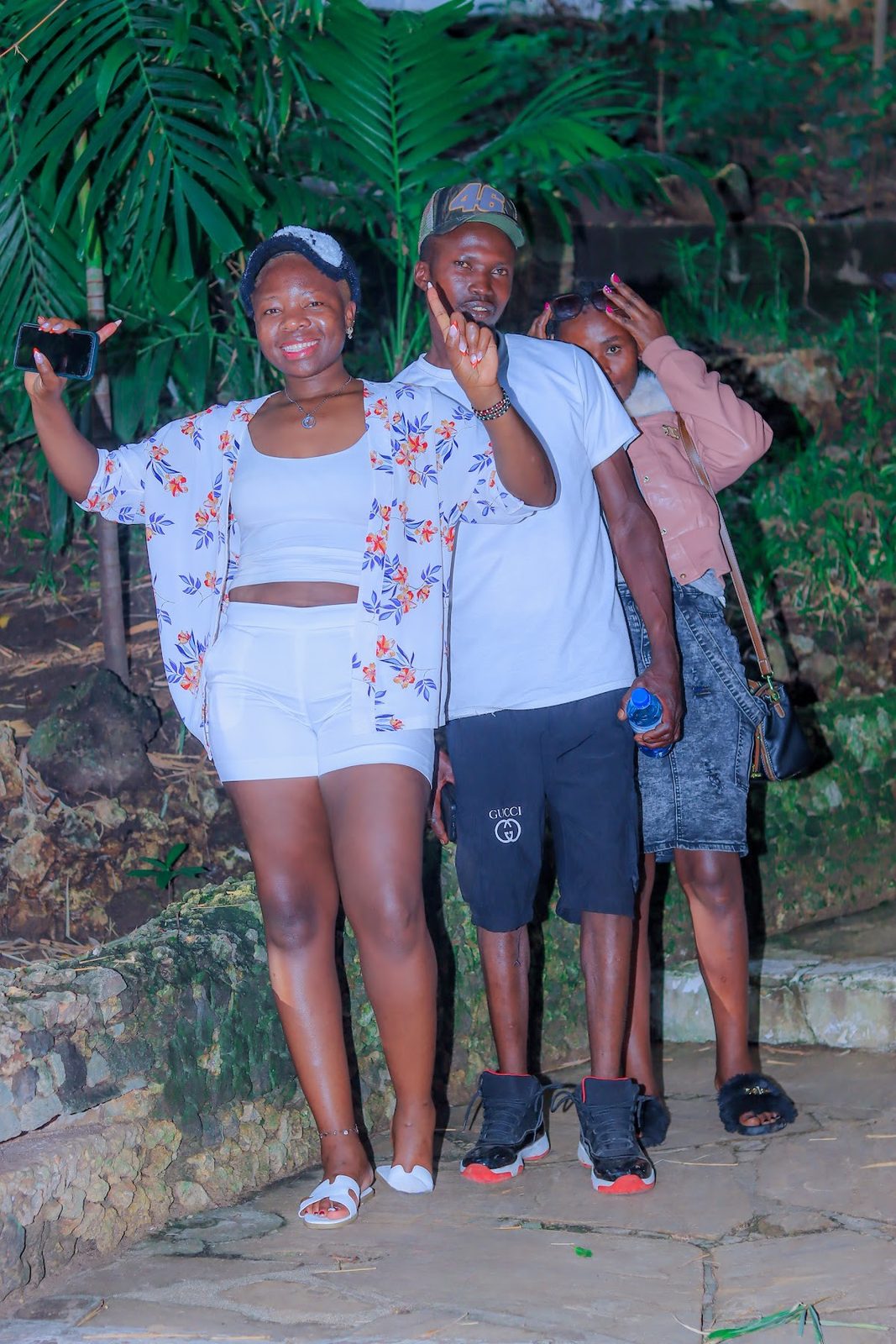 Guests posing together at the evening creek gathering