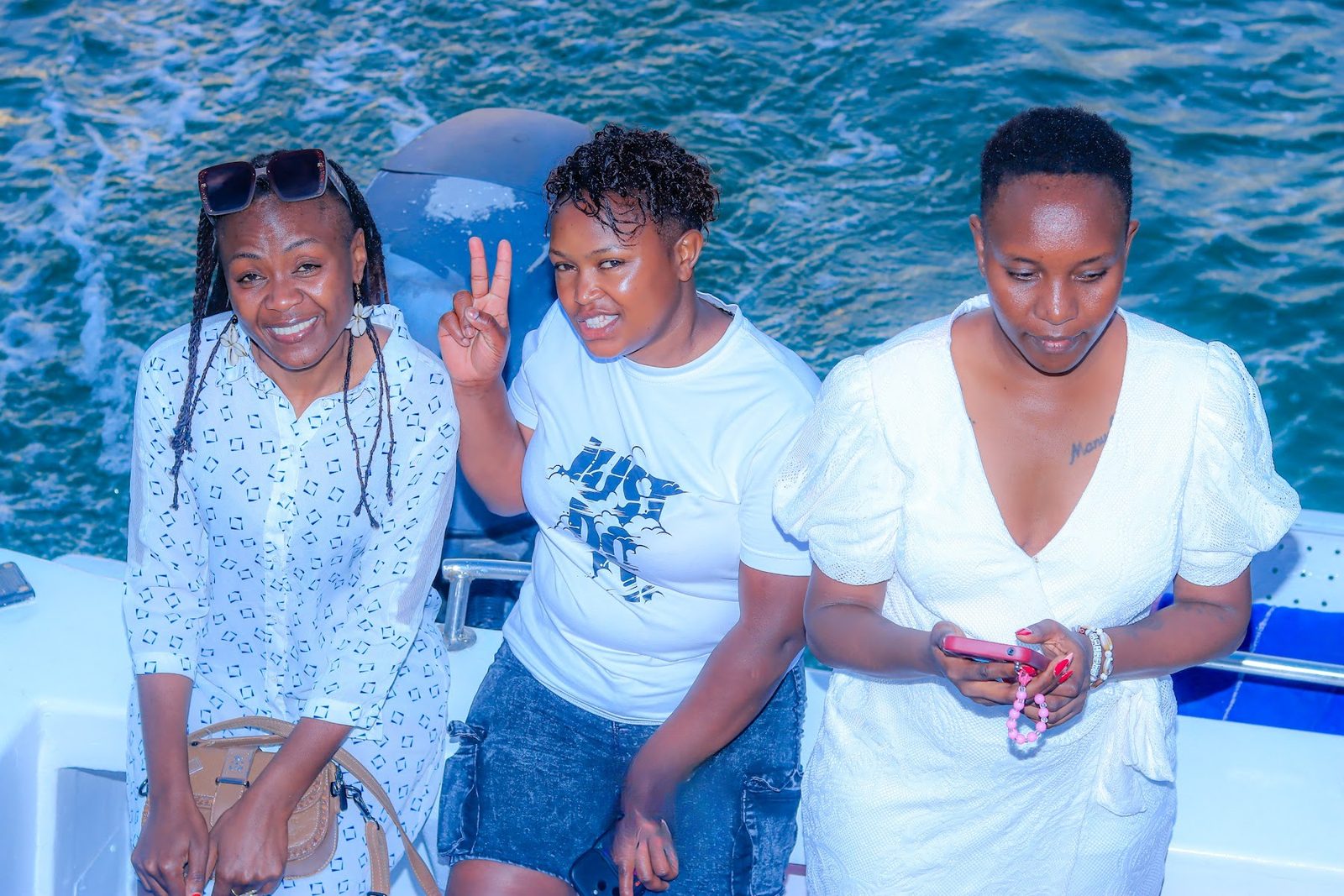 Guests flashing peace signs on the cruise