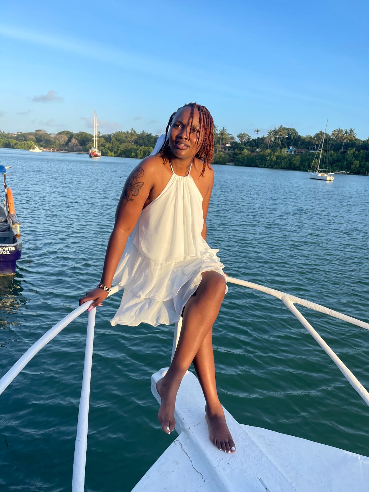Guests relaxing on the boat deck during the Mombasa sunset cruise