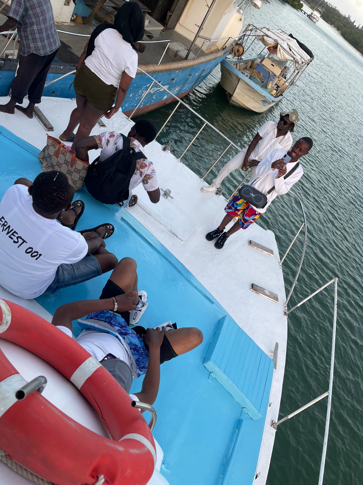 Guests enjoying golden-hour light aboard the sunset cruise