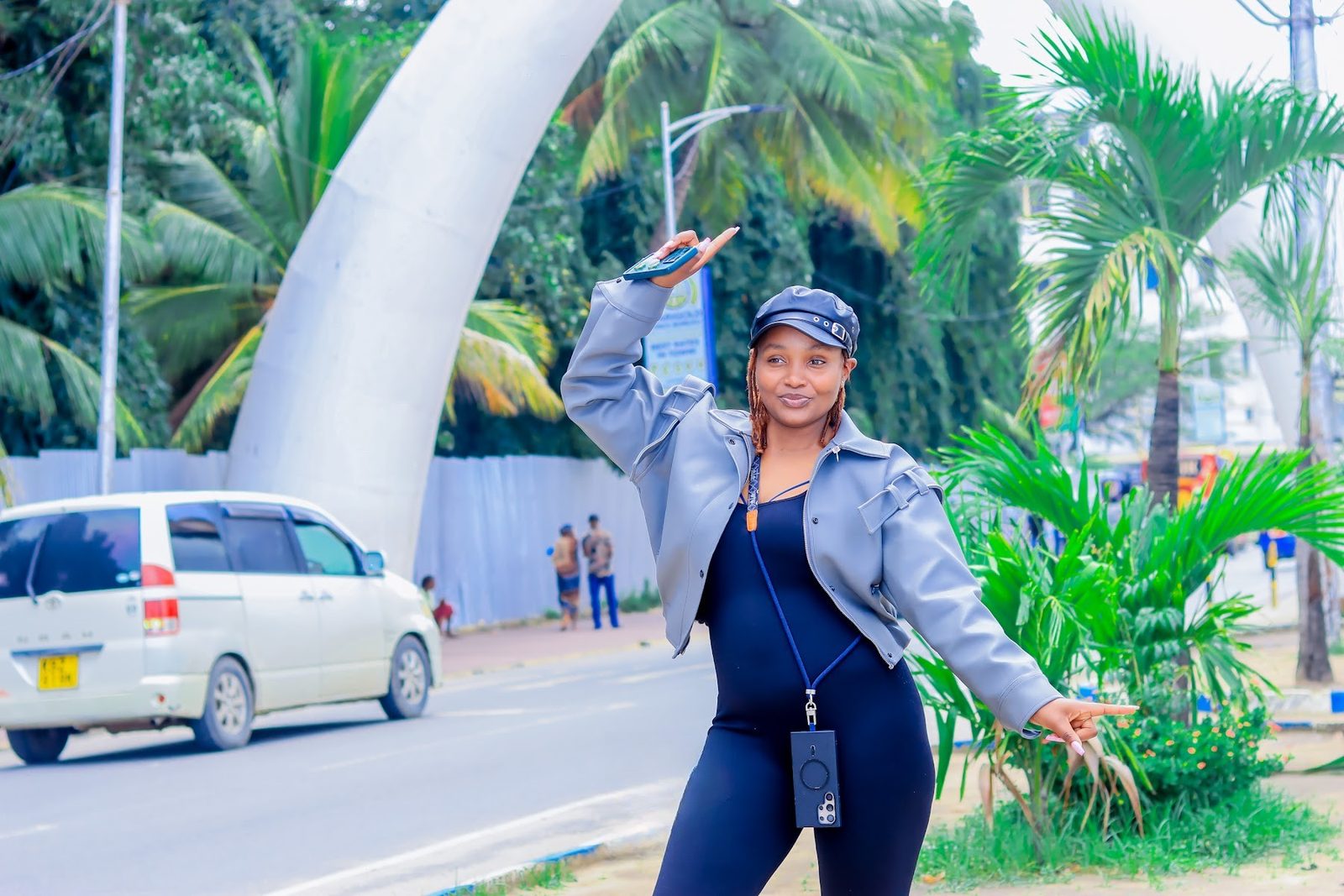 Guest posing in front of the Mombasa Tusks