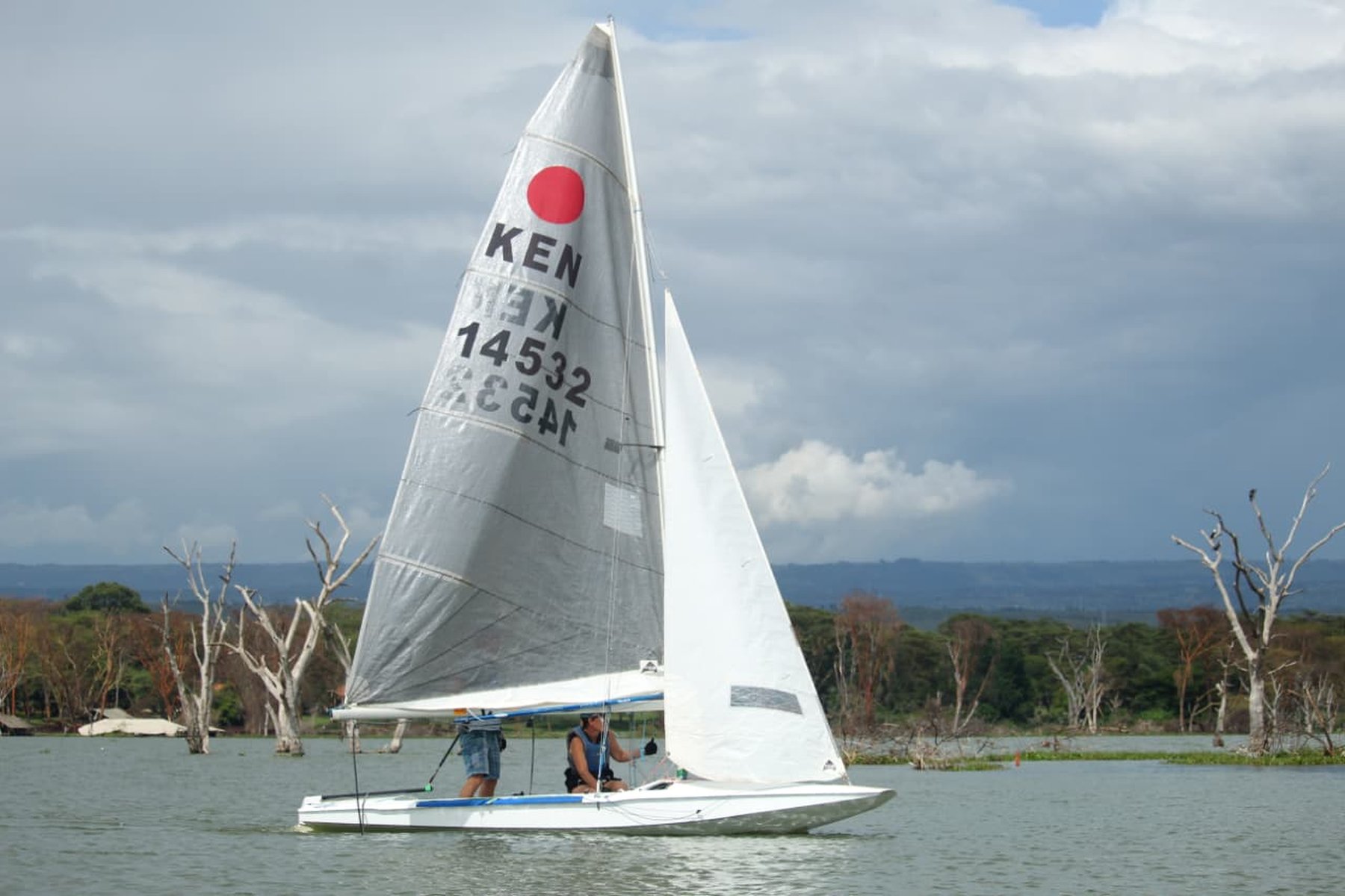Sailing dinghy racing across Lake Naivasha